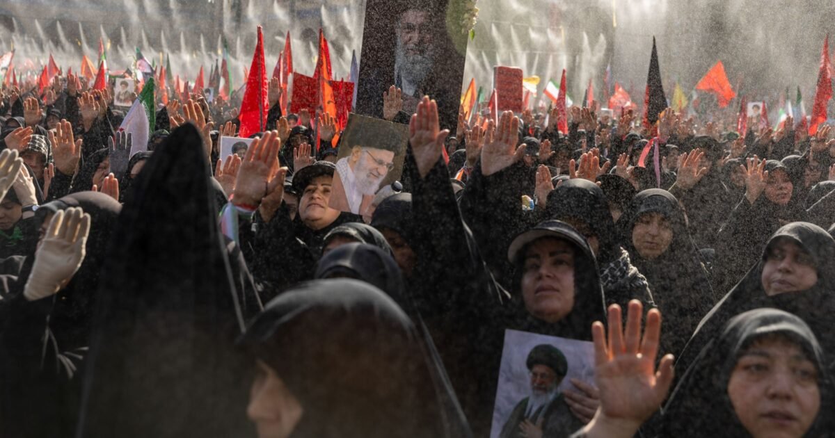 Mourners hold portraits of Supreme Leader Ayatollah Ali Khamenei on the second day of his funeral ceremonies at the Grand Mosalla on July 5, 2026, in Tehran.Majid Saeedi—Getty Images